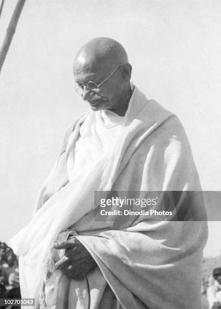 Indian statesman and activist Mohandas Karamchand Gandhi at a public meeting in Madras, 1946.