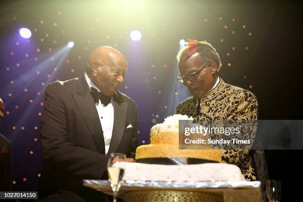 Mangosuthu Buthelezi with his longtime friend Richard Maponya at Buthelezis lavish 90th birthday celebration gala dinner on September 01, 2018 at...