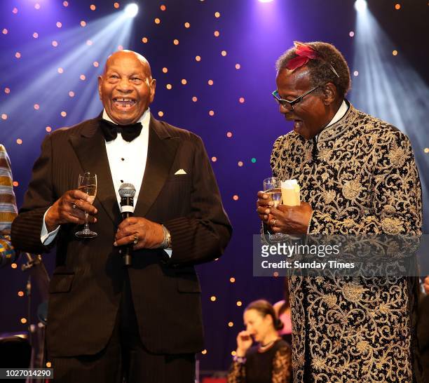 Mangosuthu Buthelezi with his longtime friend Richard Maponya at Buthelezis lavish 90th birthday celebration gala dinner on September 01, 2018 at...