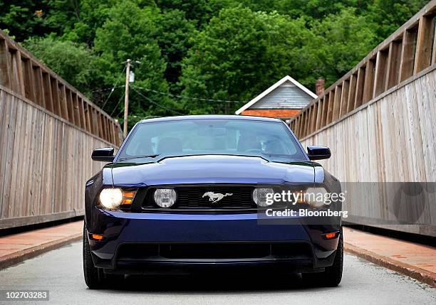 Ford Motor Co.'s 2011 Mustang GT is photographed near Port Jervis, New York, U.S., on Monday, June 14, 2010. The Mustang GT has a new 5.0 liter V-8...