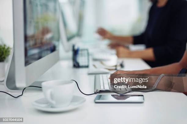signing up some new clients to the system - topics stock pictures, royalty-free photos & images