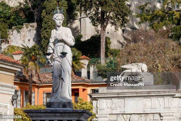 statue of justice in liberty square - civil law stock pictures, royalty-free photos & images