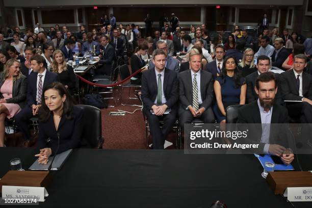 Facebook chief operating officer Sheryl Sandberg and Twitter chief executive officer Jack Dorsey arrive for a Senate Intelligence Committee hearing...