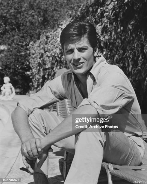 French actor Alain Delon at his Beverly Hills home, 1964. He is in the US to start work on his latest film, 'Once A Thief'.