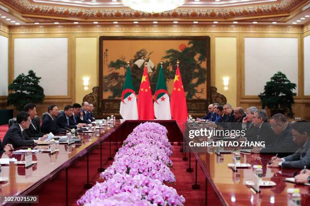 Algerian Prime Minister Ahmed Ouyahia meets with Chinese President Xi Jinping at the Great Hall of the People in Beijing on September 5 a day after...