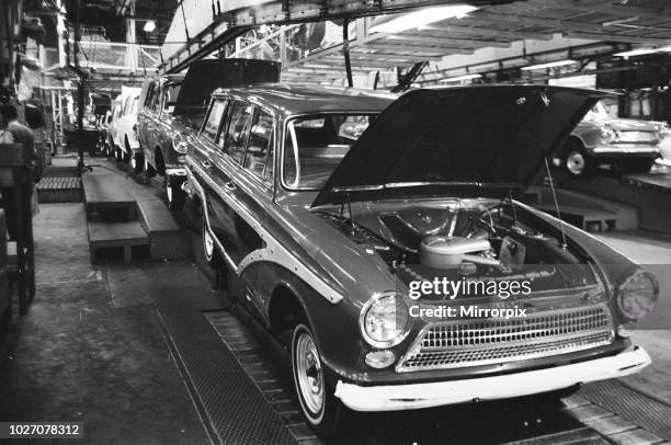 General scenes inside the Ford motor factory in Dagenham, Essex showing cars on the production line. 24th January 1964.