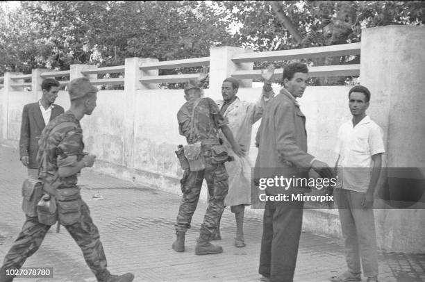 The Bizerte Crisis 1961 French soldiers search an arab man on the the streets of Bizerte after they had overwhelmed the city. 24th July 1961.