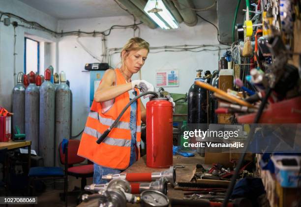 safety first - fire extinguisher inspection stock pictures, royalty-free photos & images