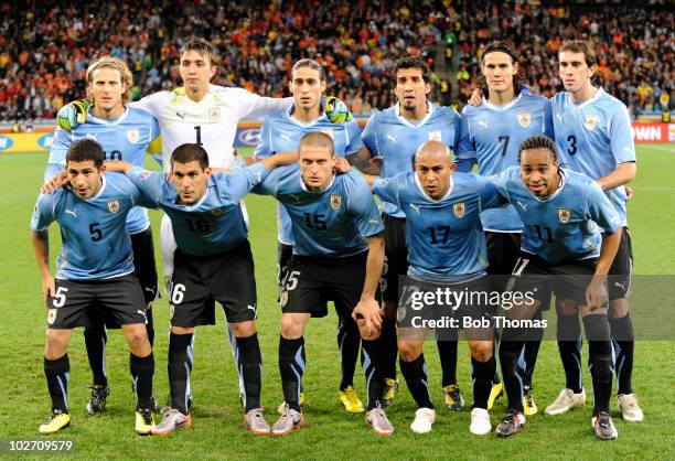 The Uruguay team pose for a team group prior to the start of the 2010 FIFA World Cup South Africa Semi Final match between Uruguay and the...