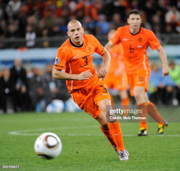 John Heitinga of the Netherlands during the 2010 FIFA World Cup South Africa Semi Final match between Uruguay and the Netherlands at Green Point...