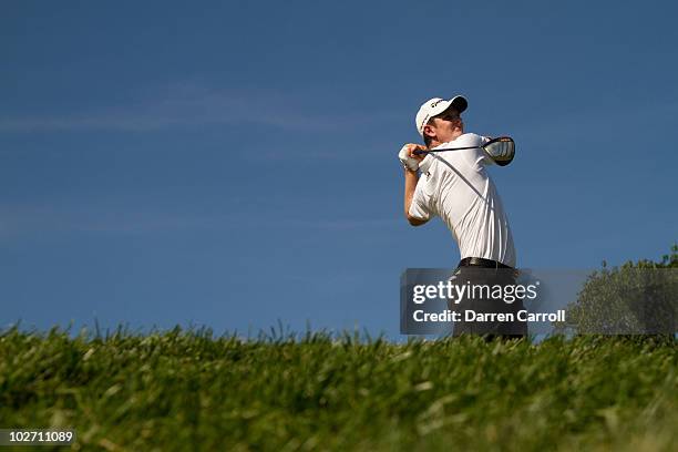 Justin Rose of England hits a shot during the fourth round of the AT&T National at Aronimink Golf Club on July 4, 2010 in Newtown Square,...