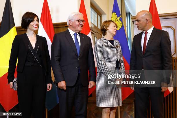 Swiss President Alain Berset , his wife Muriel Zeender Berset welcome German President Frank-Walter Steinmeier and his wife Elke Buedenbender prior...