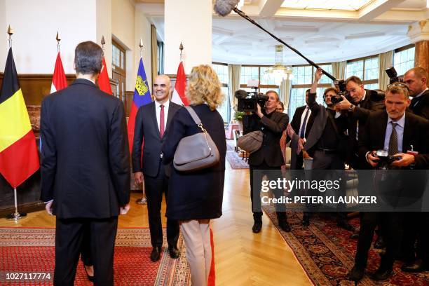 Swiss President Alain Berset welcomes Hereditary Prince Alois of Liechtenstein and Hereditary Princess Sophie of Liechtenstein prior to a meeting of...