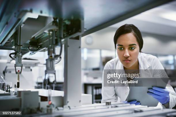 she finds the answers to life’s mysteries - technical laboratories stock pictures, royalty-free photos & images