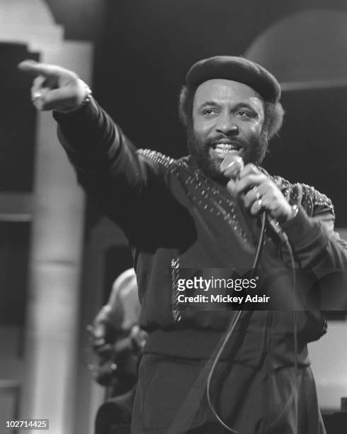 Singer Andrae Crouch performs at the musical gala for the first MLK day on January 20, 1986 in Atlanta, Georgia.