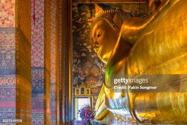 big buddha at wat pho, bangkok, thailand - reclining buddha statue stock pictures, royalty-free photos & images