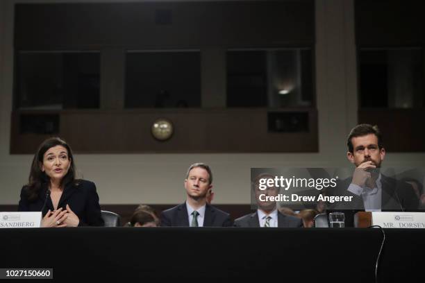 Facebook chief operating officer Sheryl Sandberg and Twitter chief executive officer Jack Dorsey testify during a Senate Intelligence Committee...