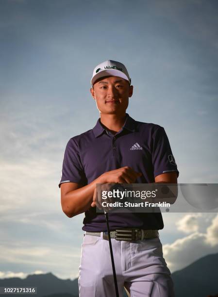 Haotong Li of China poses for a picture during the pro - am prior to the start of the Omega European Masters at Crans-sur-Sierre Golf Club on...