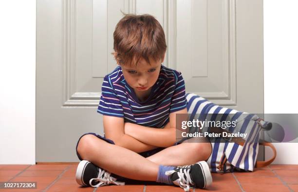 child waiting on home doorstep - six year old stock pictures, royalty-free photos & images