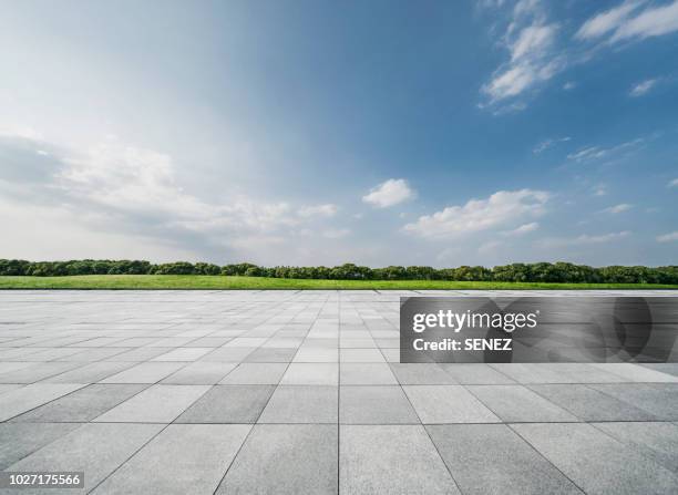 empty parking lot - dramatic sky horizon stock pictures, royalty-free photos & images