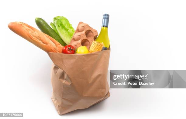 delivery of healthy fruit and vegetables - brown bag stock pictures, royalty-free photos & images