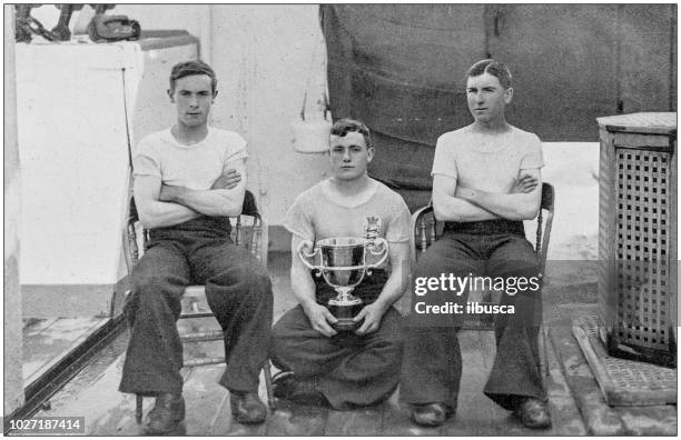 navy and army antique historical photographs: military game winners - cup portraits stock illustrations
