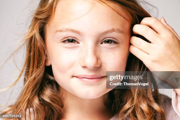 portrait of a 10 years old pretty girl  - child teenager face hair beauty fun eyes freckles - 8 9 years stock pictures, royalty-free photos & images