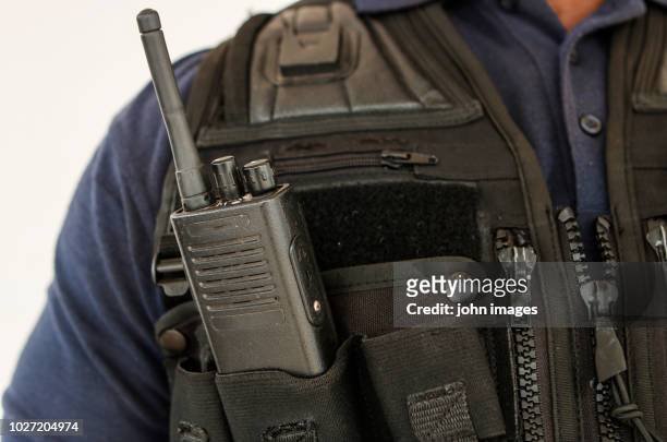 a security officer dressed vest - bullet proof vest stock pictures, royalty-free photos & images