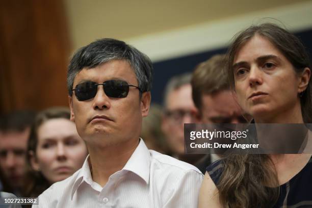 Chinese dissident Chen Guangcheng listens as Twitter chief executive officer Jack Dorsey testifies during a House Committee on Energy and Commerce...