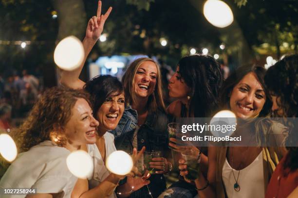 happy friends having fun together - aperitif stock pictures, royalty-free photos & images