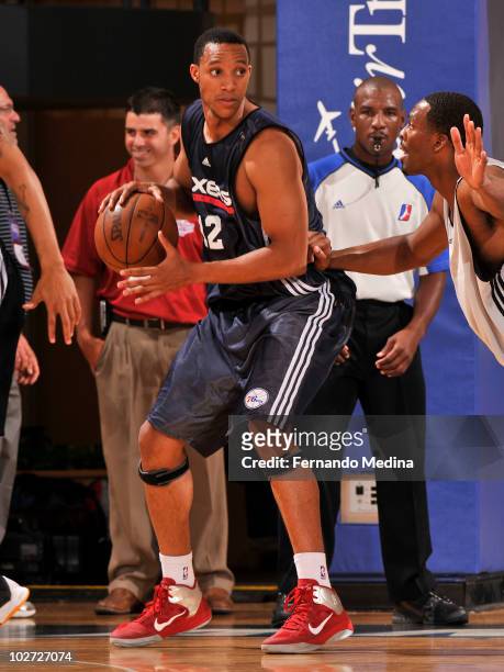Evan Turner of the Philadelphia 76ers moves the ball against the Charlotte Bobcats during the 2010 AirTran Orlando Summer League on July 8, 2010 at...