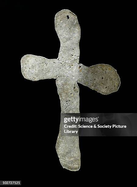 Crudely executed cross of lead, England, c.1349. Crudely executed plague cross of lead, placed on corpse of Grey Friars monk, who was victim of Black...