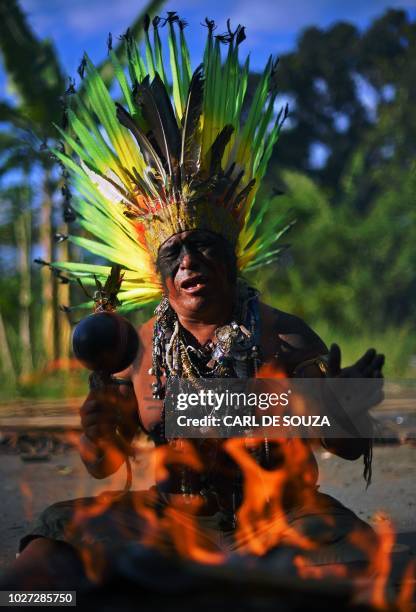 Native Korubo Isolado, from the Brazilian state of Acre, performs a ritual at the abandoned and crumbling Indian Museum complex, near the National...