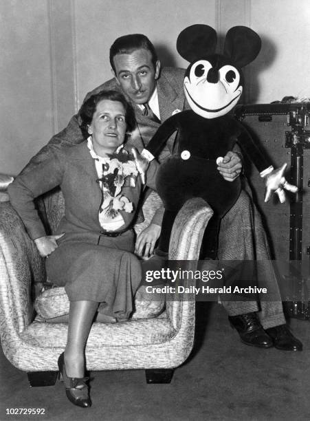 Mr and Mrs Walt Disney with Mickey Mouse, London, 21 June 1935. Walt Disney , American animator and showman, with his wife Lillian and one of his...