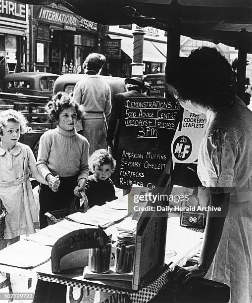 Ww2 Ration Queue 654 Ww2 Rationing Stock Photos, High-Res Pictures, and Images - Getty ...