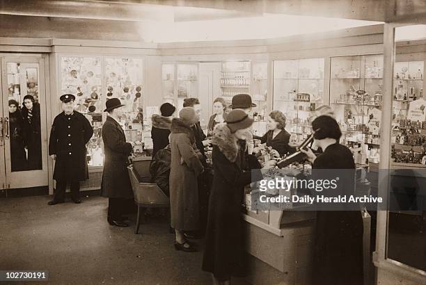 Interior of Boots the Chemist, Regent Street, London, 8 December 1932. " Photograph by George Woodbine.
