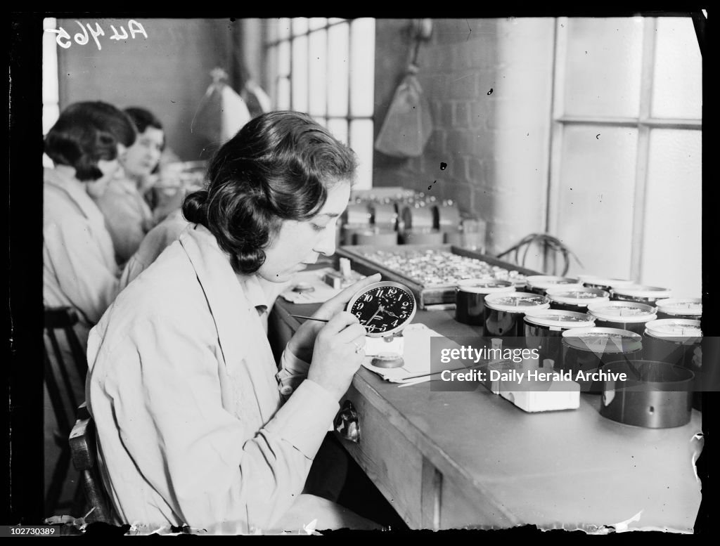 Women painting alarm clock faces, Ingersoll factory, January 1932.