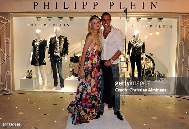 Mischa Barton and Philipp Plein attend the Philipp Plein Boutique opening party on July 8, 2010 in Saint-Tropez, France.