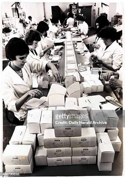 The Pill', 1965. A photograph showing a factory line of women packing boxes containing the contraceptive pill, taken by Chris Barham in 1965 for the...