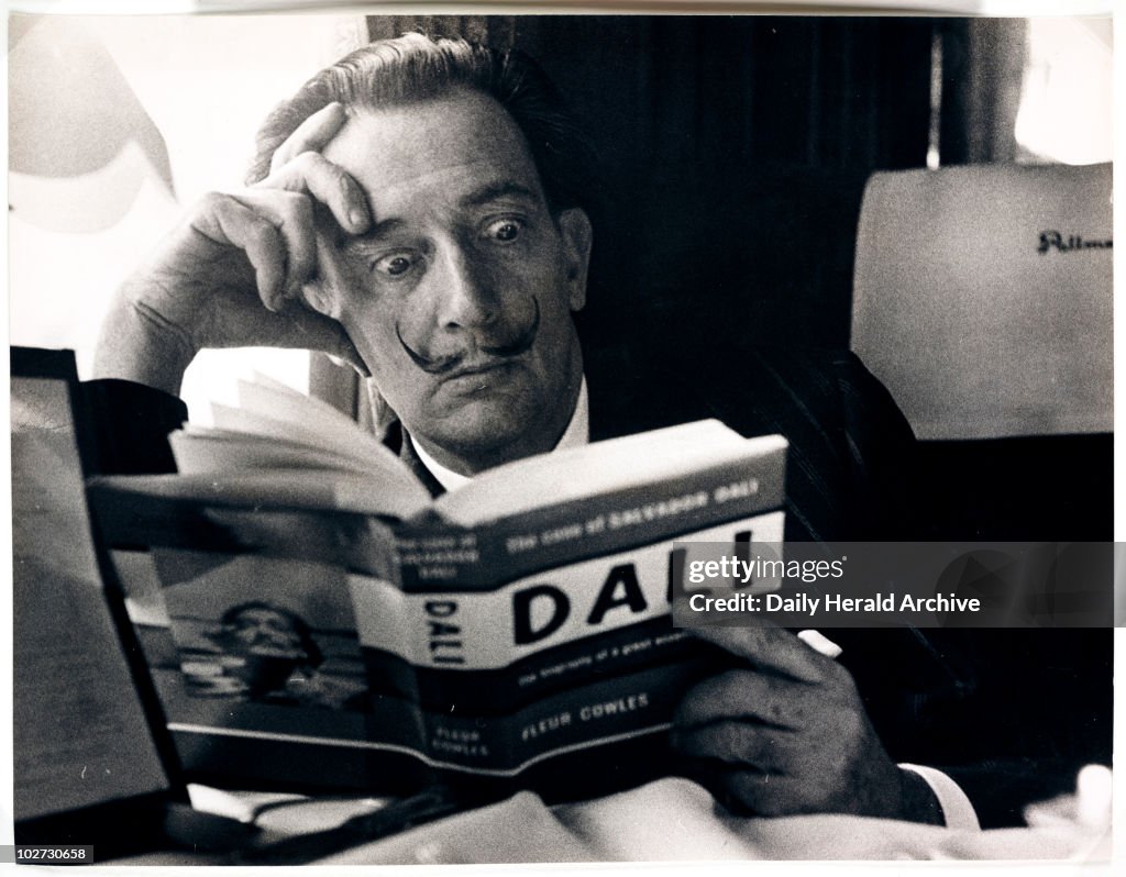 Salvador Dali reading his biography, 6 May, 1959.