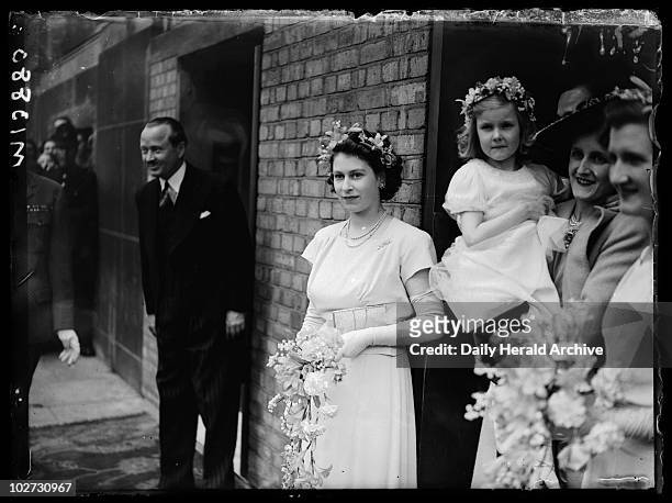 Bridesmaid Princess Elizabeth at a wedding, 1946. A photograph of Princess Elizabeth as bridesmaid to Hon. Mrs. Vicary Gibbs and Captain Hon. A.G.V....