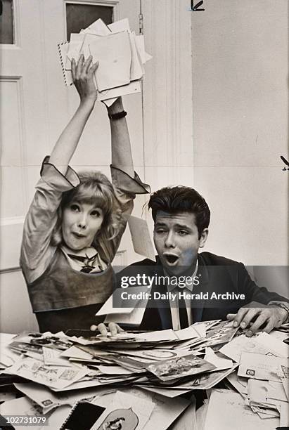 Cliff Richard and Susan Hampshire, October 1963. Cliff Richard and Susan Hampshire reading their fan mail.