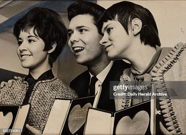 Cliff Richard, Rita Tushingham and Helen Shapiro', 1961. Daily Herald photograph of three winners at the Variety Awards 1961. Cliff Richard won the...