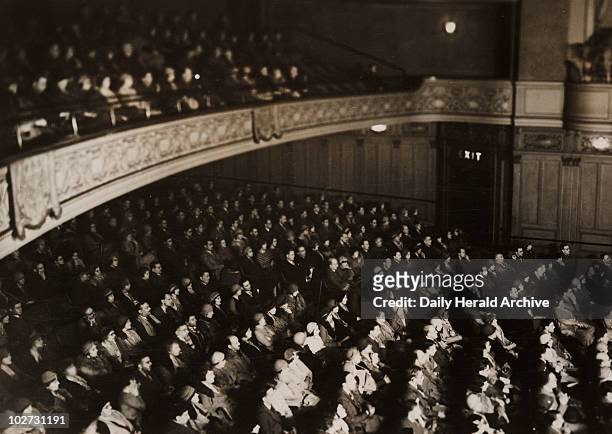 Audience photographed in infrared light, 1930s. Photograph taken using the Ilford Infra-Red Process of an audience watching The Sign of the Cross...