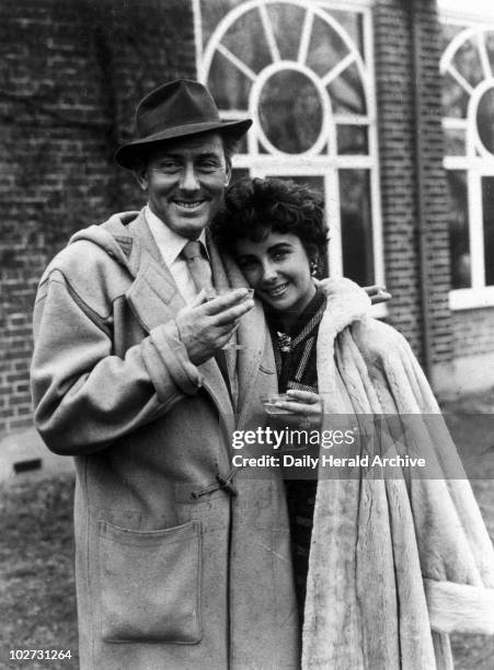 Michael Wilding and Elizabeth Taylor, British actors, 1952." The Wildings at Shepperton Studios after their honeymoon. Elizabeth Taylor, who was born...