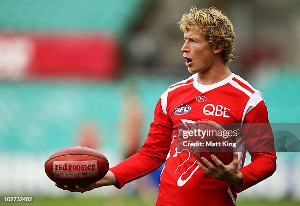 Craig Bolton speaks to team mates during a Sydney Swans AFL training session at the Sydney Cricket Ground on July 9, 2010 in Sydney, Australia.