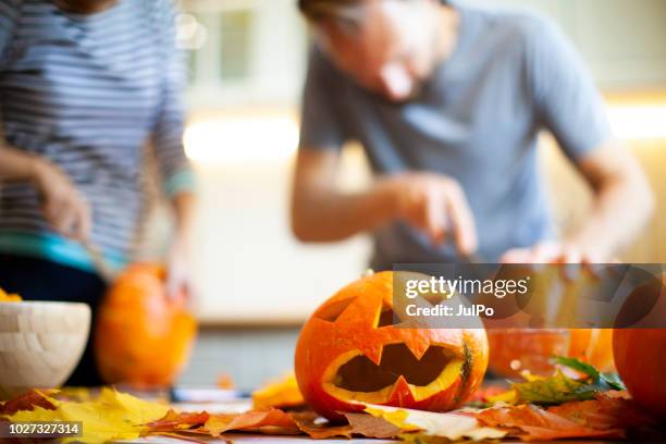 getting ready for halloween - carving stock pictures, royalty-free photos & images