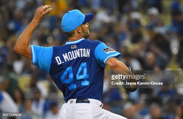 Rich Hill of the Los Angeles Dodgers pitches in the game against the San Diego Padres at Dodger Stadium on August 24, 2018 in Los Angeles,...