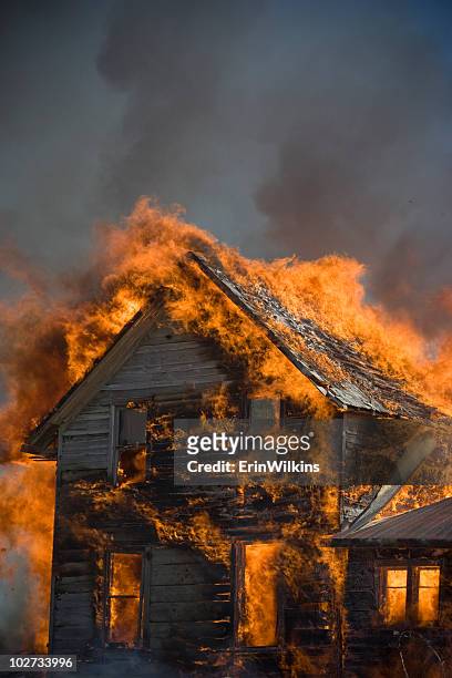 blazing wreck - burning stockfoto's en -beelden