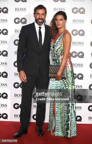 Robert Pires and Jessica Lemarie attend the GQ Men of the Year awards at Tate Modern on September 5, 2018 in London, England.